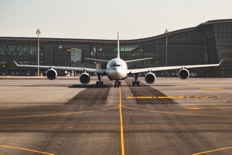Airliner seen head-on at the airport gate, ready for departure